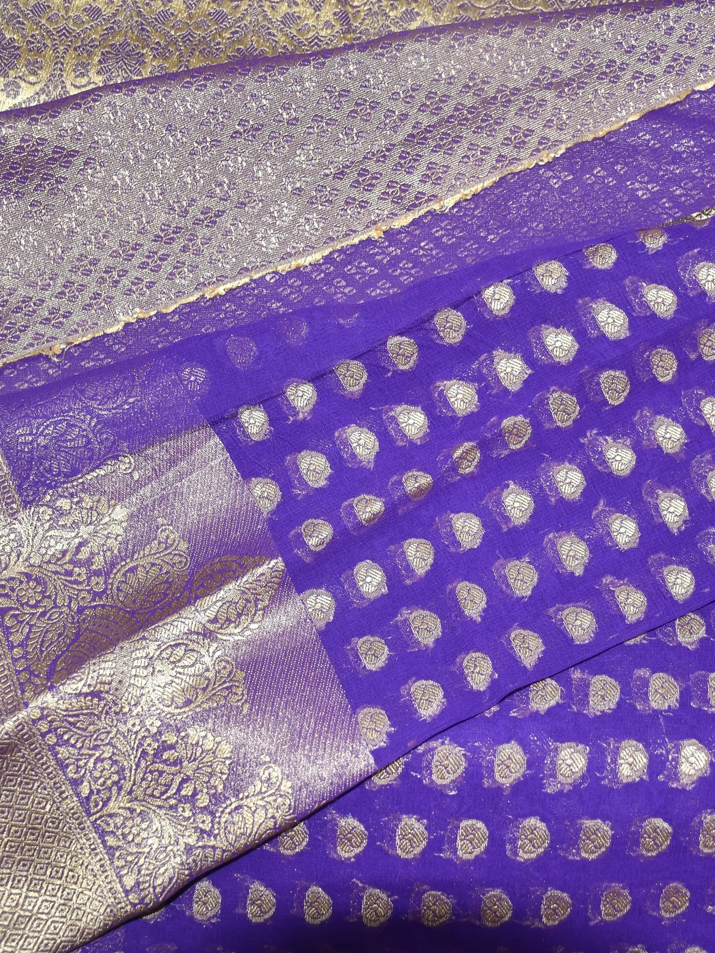 Purple silk with silver zari butis and border