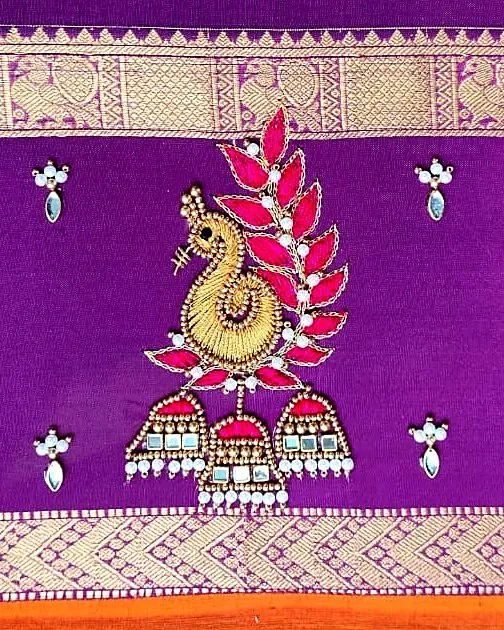 Zardosi peacock embroidery with mirror jhumkas on purple silk